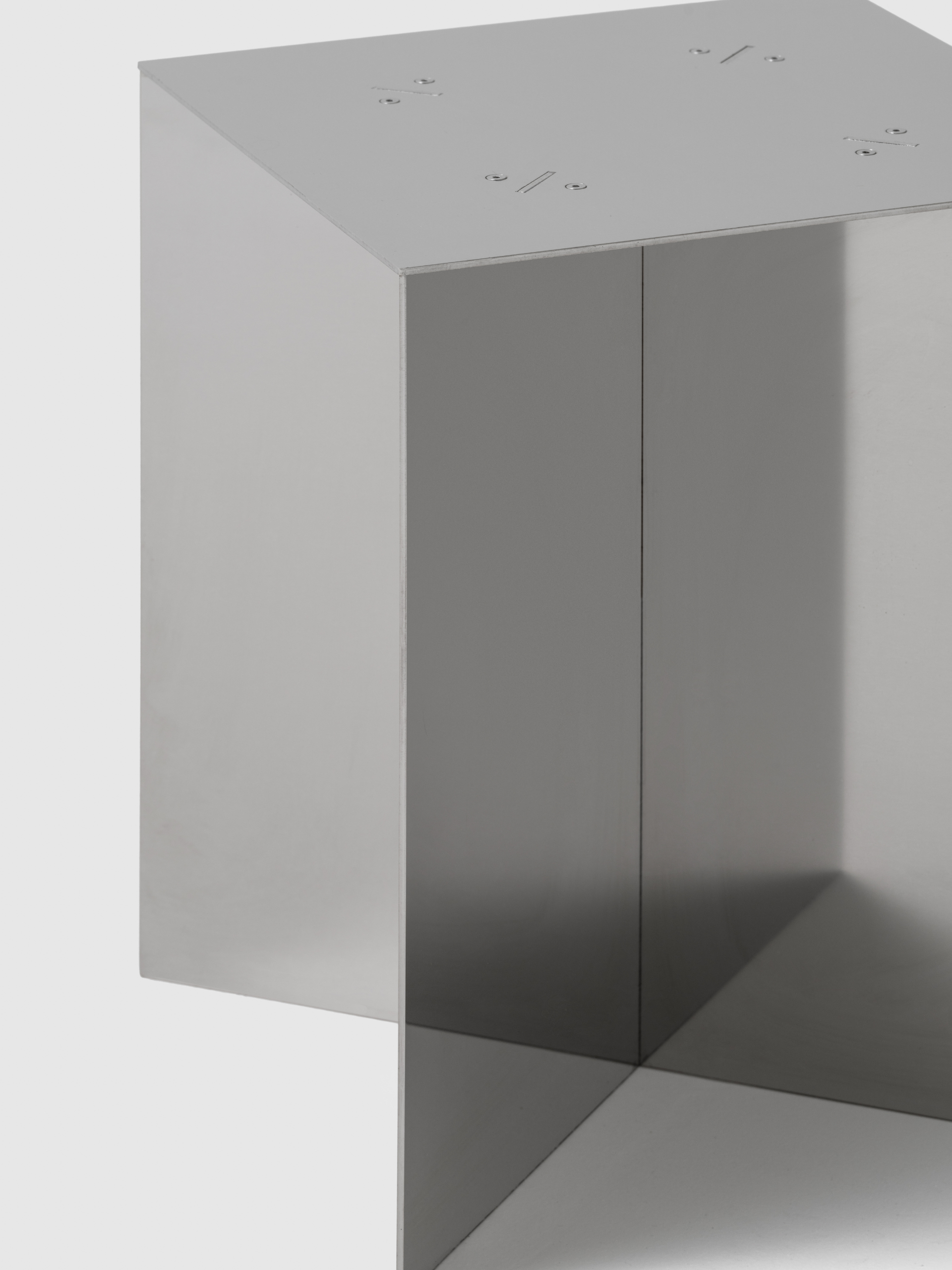 NM07 by NM3: a steel stool design locked by laser-cut precision