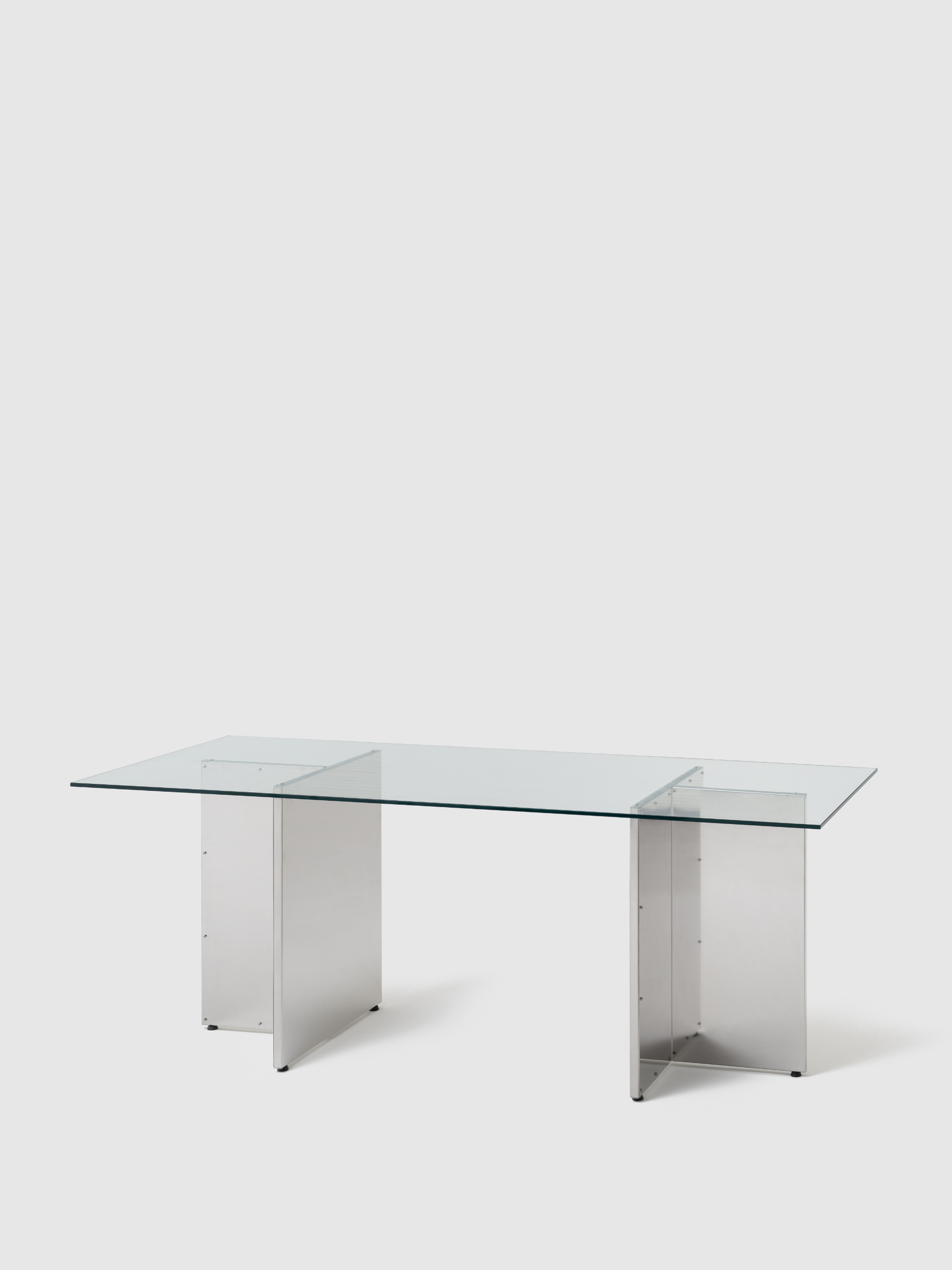 NM20 by NM3: a table design in stainless steel with glass top