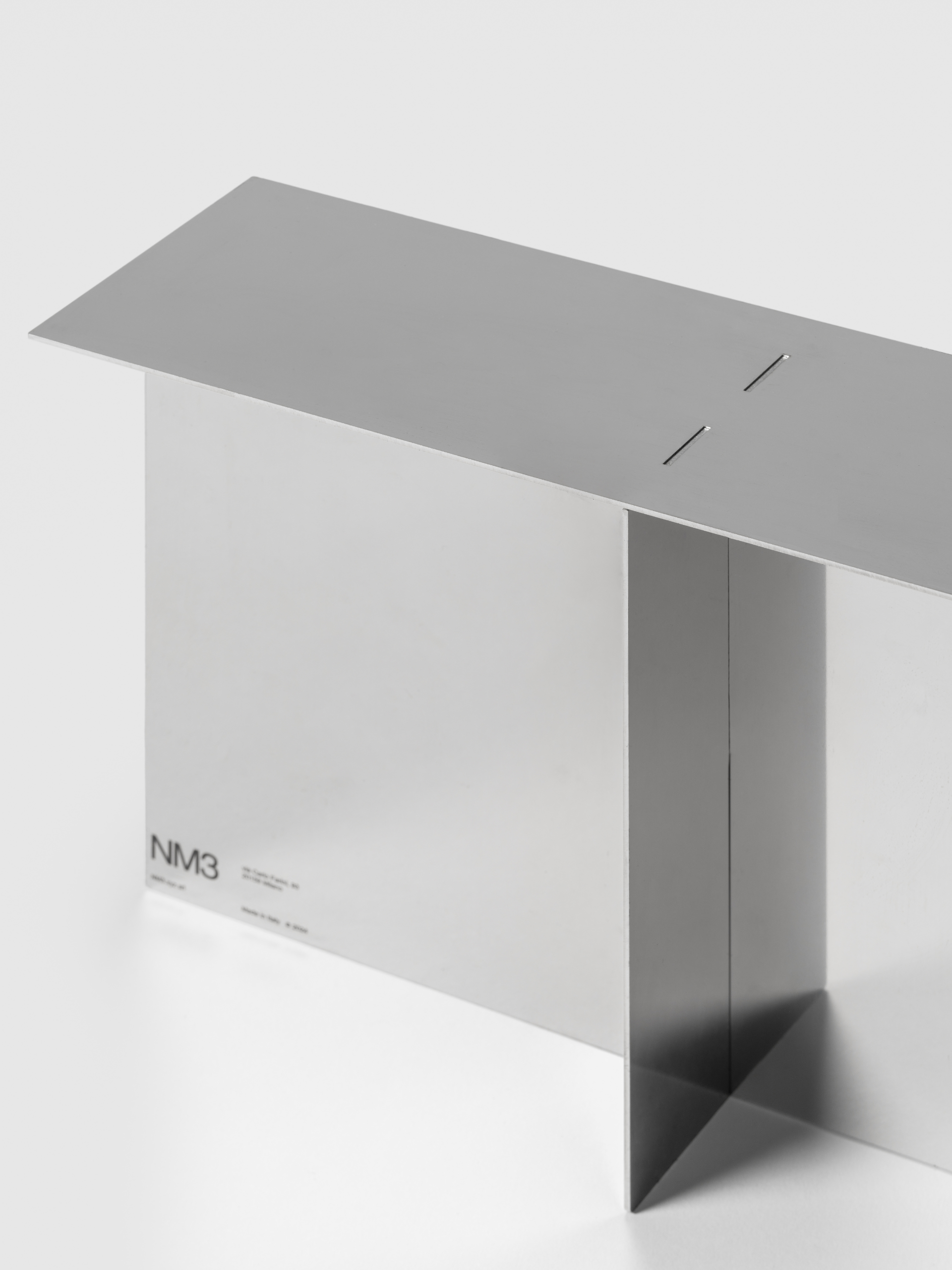 Small object, strong presence: a steel podium design by NM3